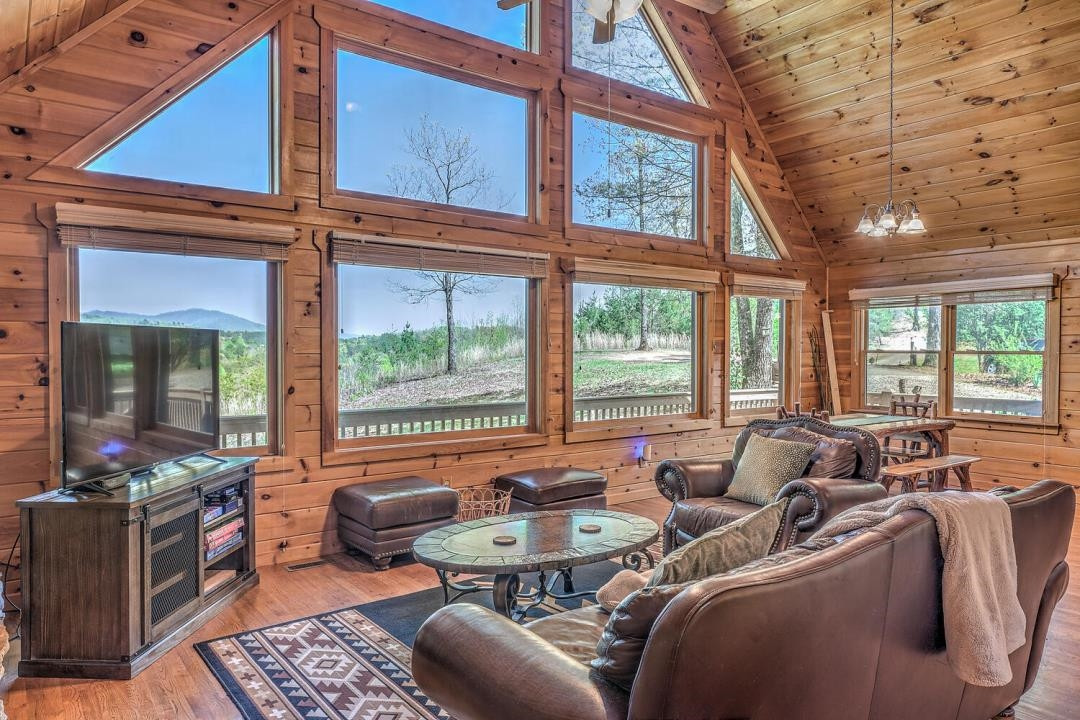 398 Pin Oak Road Murphy, NC 28906 - Photo 10 of 30 a living room with furniture large windows and wooden floor