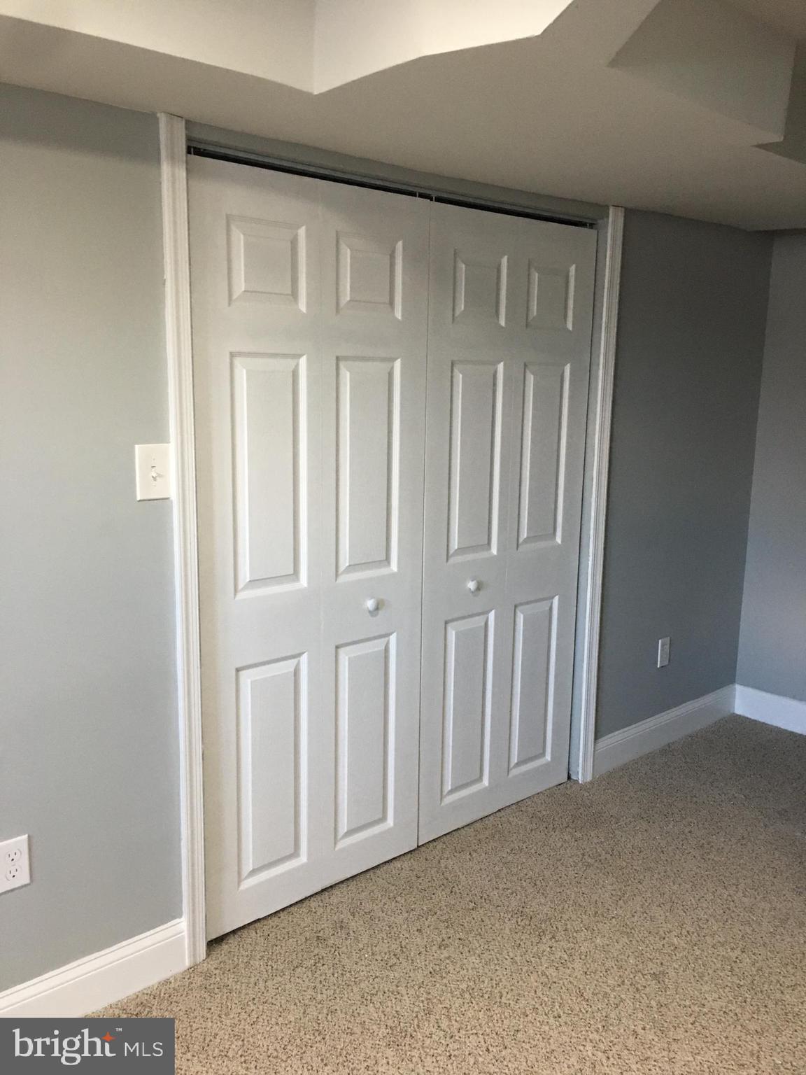 7441 Edsworth Road Baltimore, MD 21222 - Photo 27 of 37 a view of an entryway with wooden floor