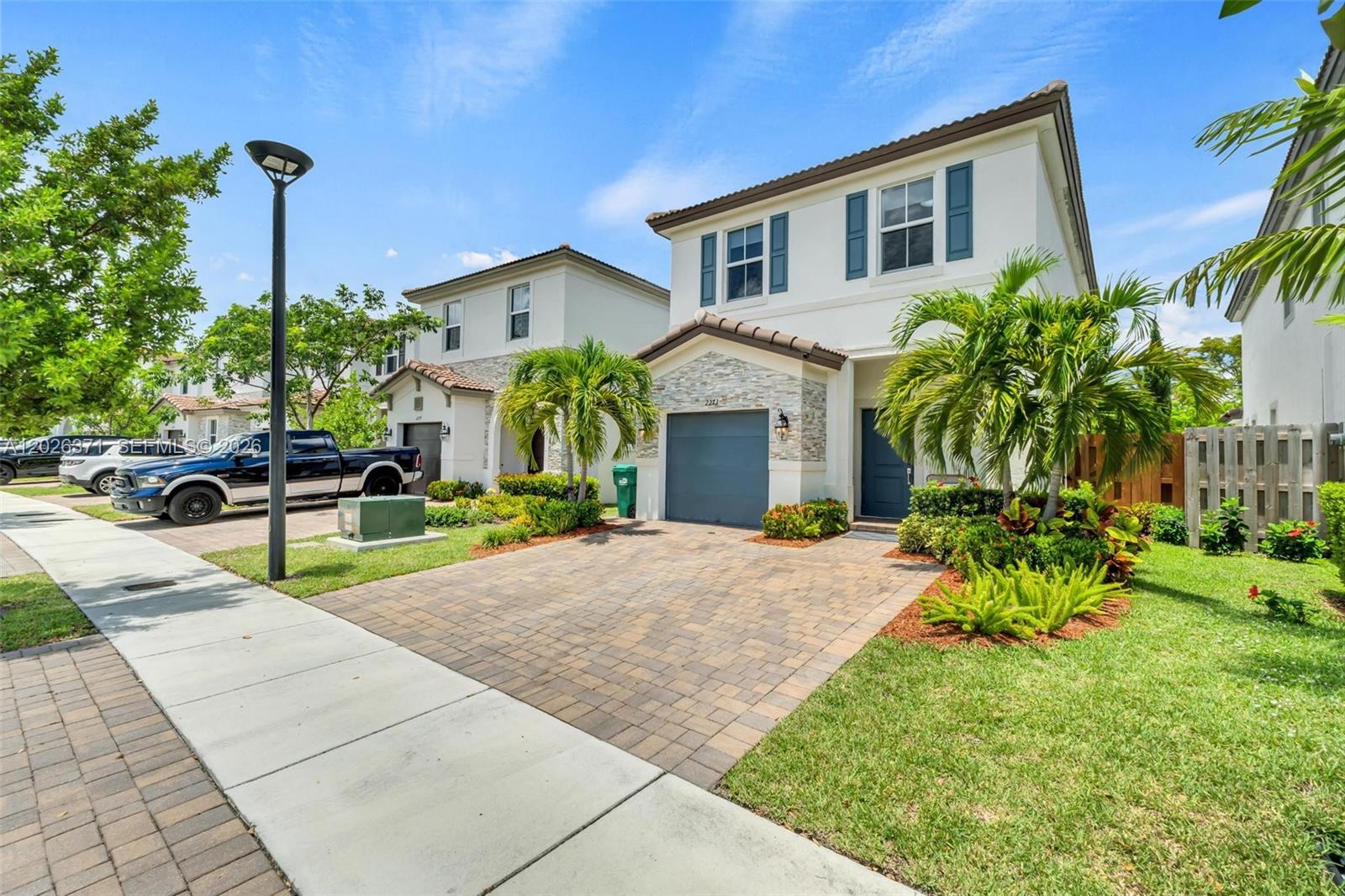 2273 Northwest 131st Circle Miami, FL 33167 - Photo 4 of 46 a house view with a garden space