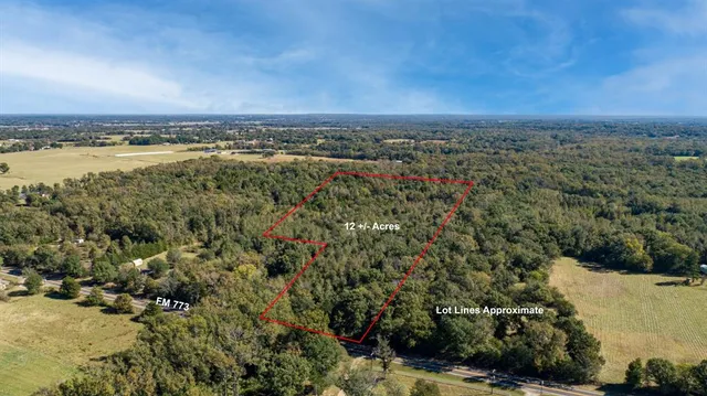 an aerial view of a city with lots of residential buildings