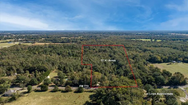 an aerial view of a city with lots of residential buildings