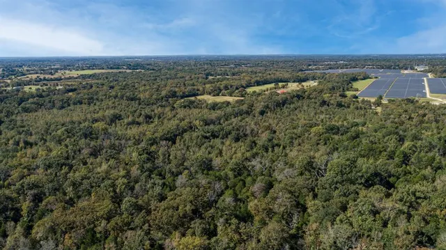 an aerial view of beach and ocean