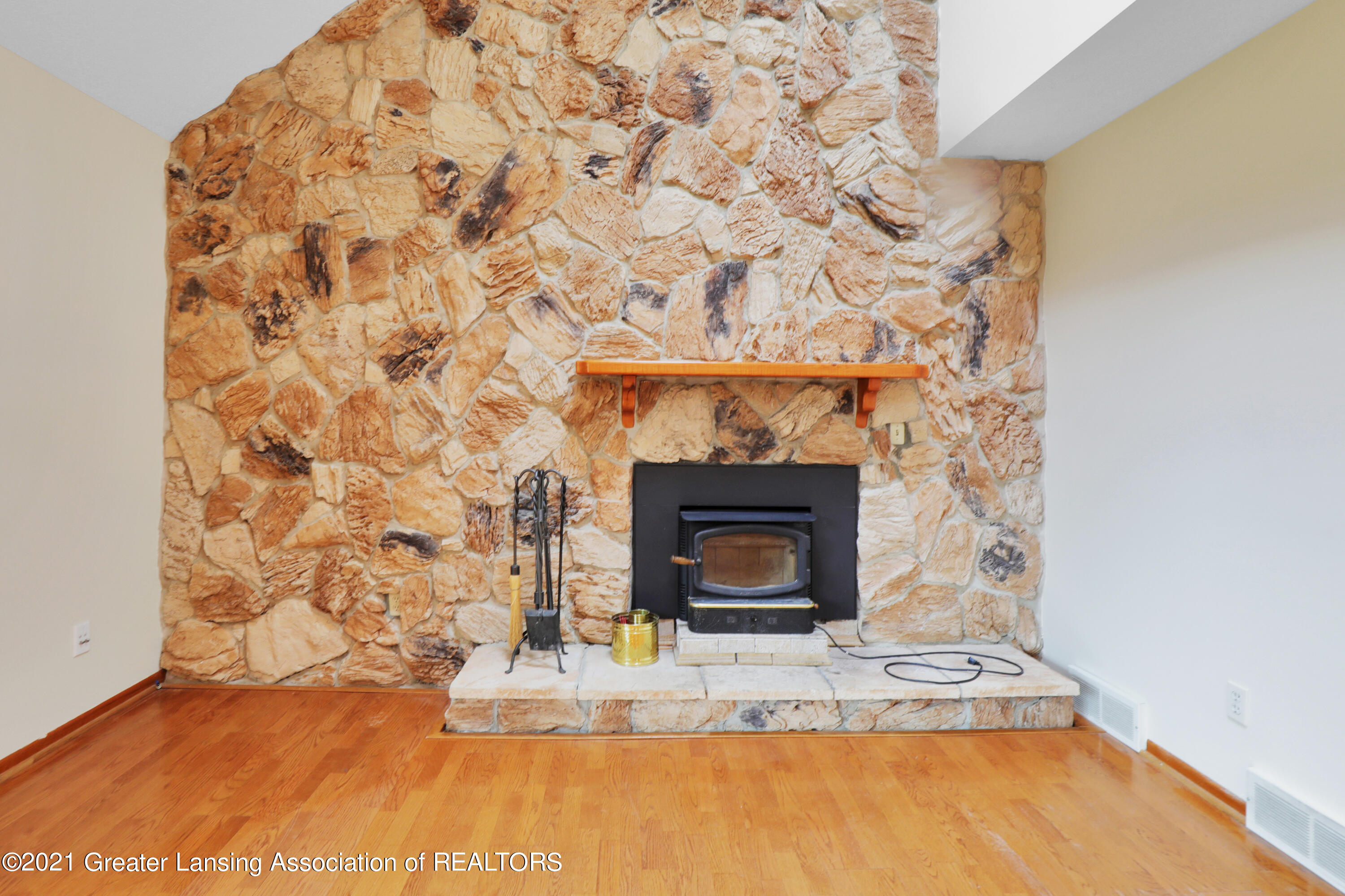 8157 Hunter Road Bath, MI 48808 - Photo 5 of 43 Fireplace