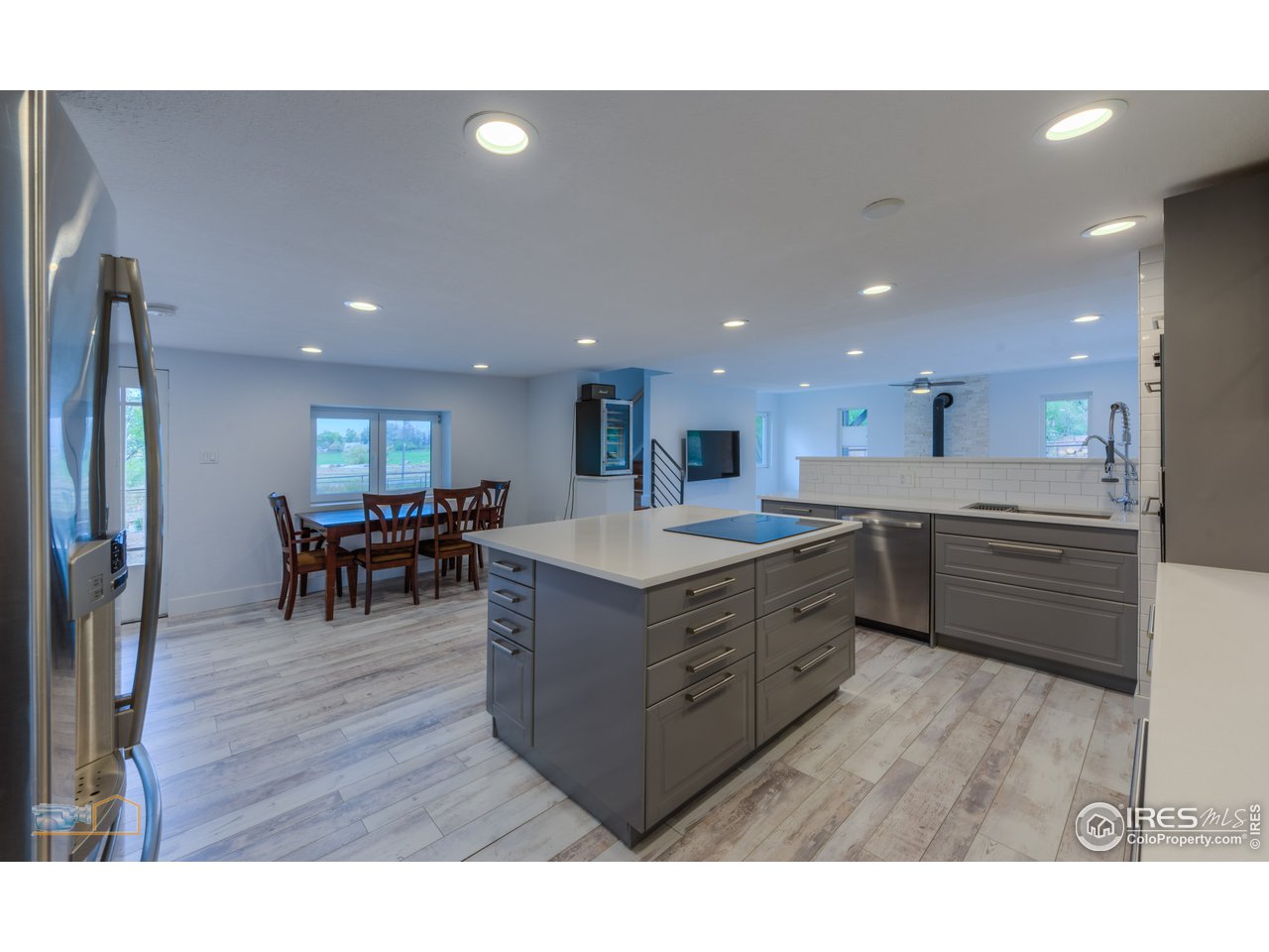8155 Hygiene Road Longmont, CO 80503 - Photo 12 of 40 a large kitchen with stainless steel appliances a large counter top