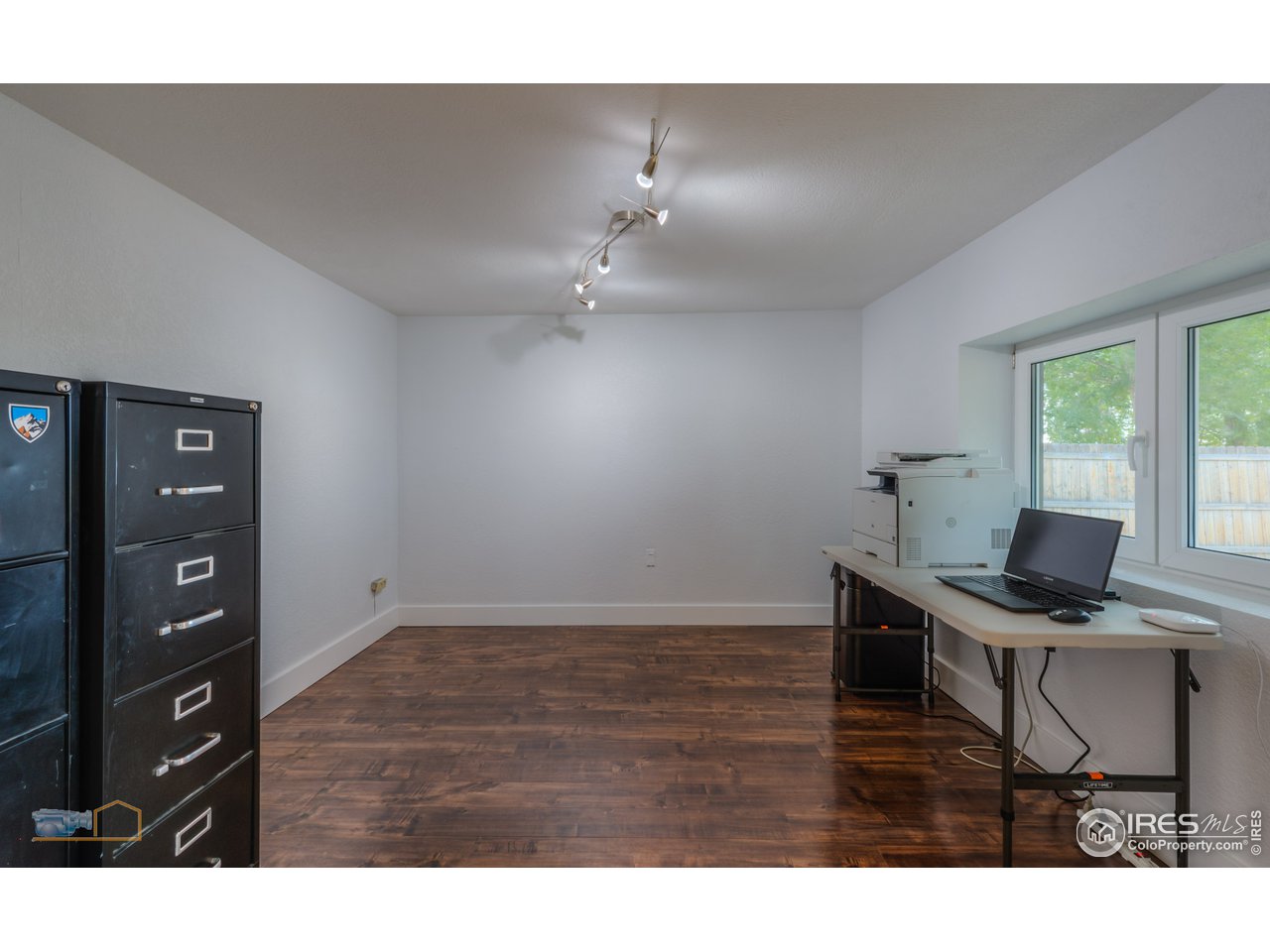 8155 Hygiene Road Longmont, CO 80503 - Photo 14 of 40 a view of a workspace with furniture