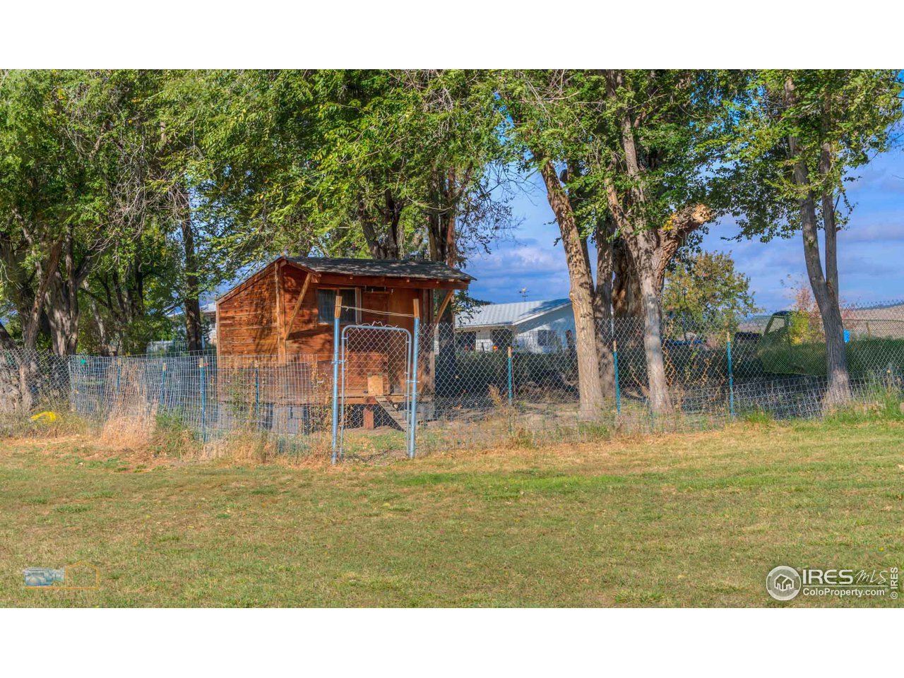 8155 Hygiene Road Longmont, CO 80503 - Photo 30 of 40 a view of a house with a yard