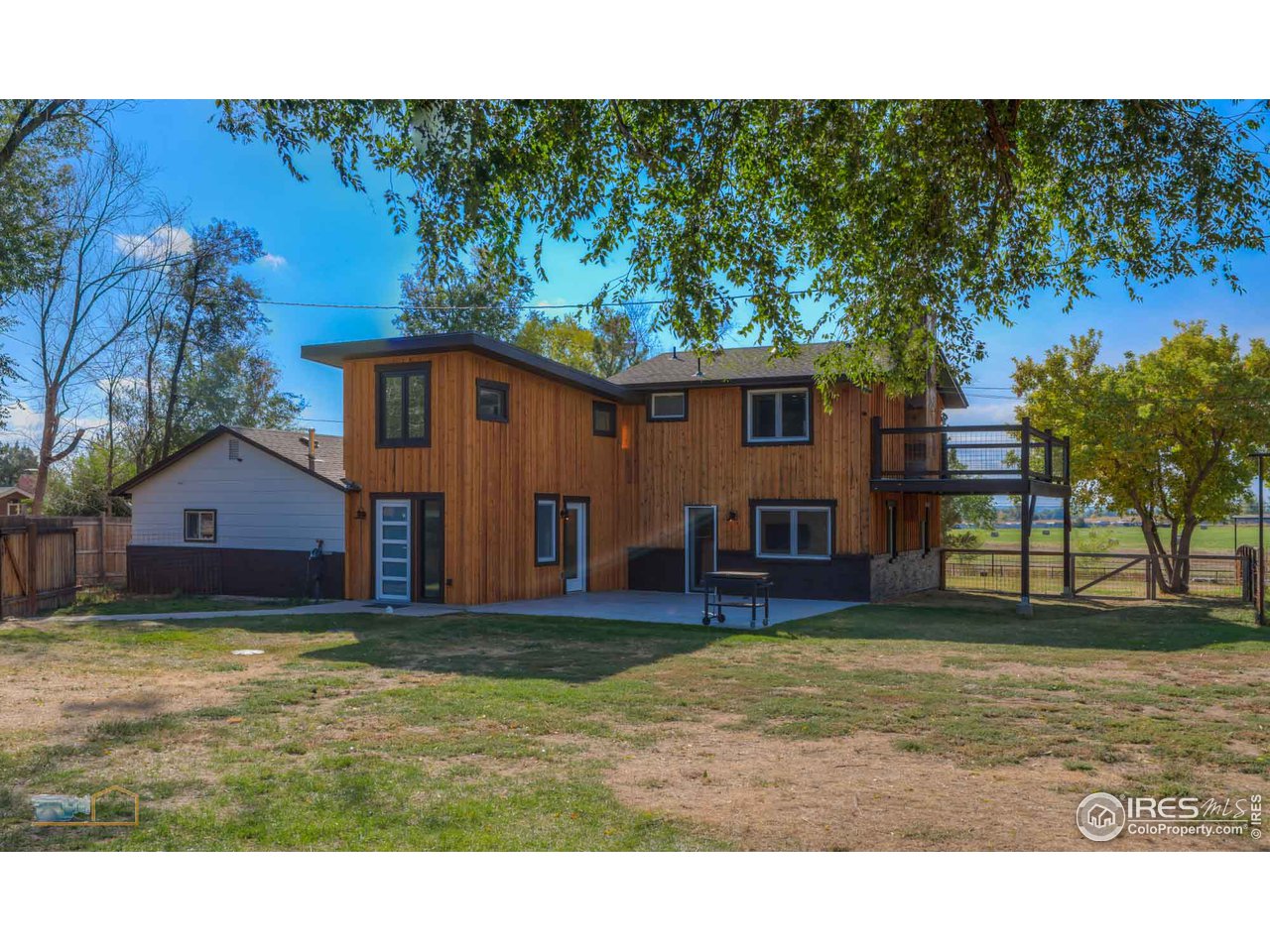 8155 Hygiene Road Longmont, CO 80503 - Photo 36 of 40 a view of a house with a yard
