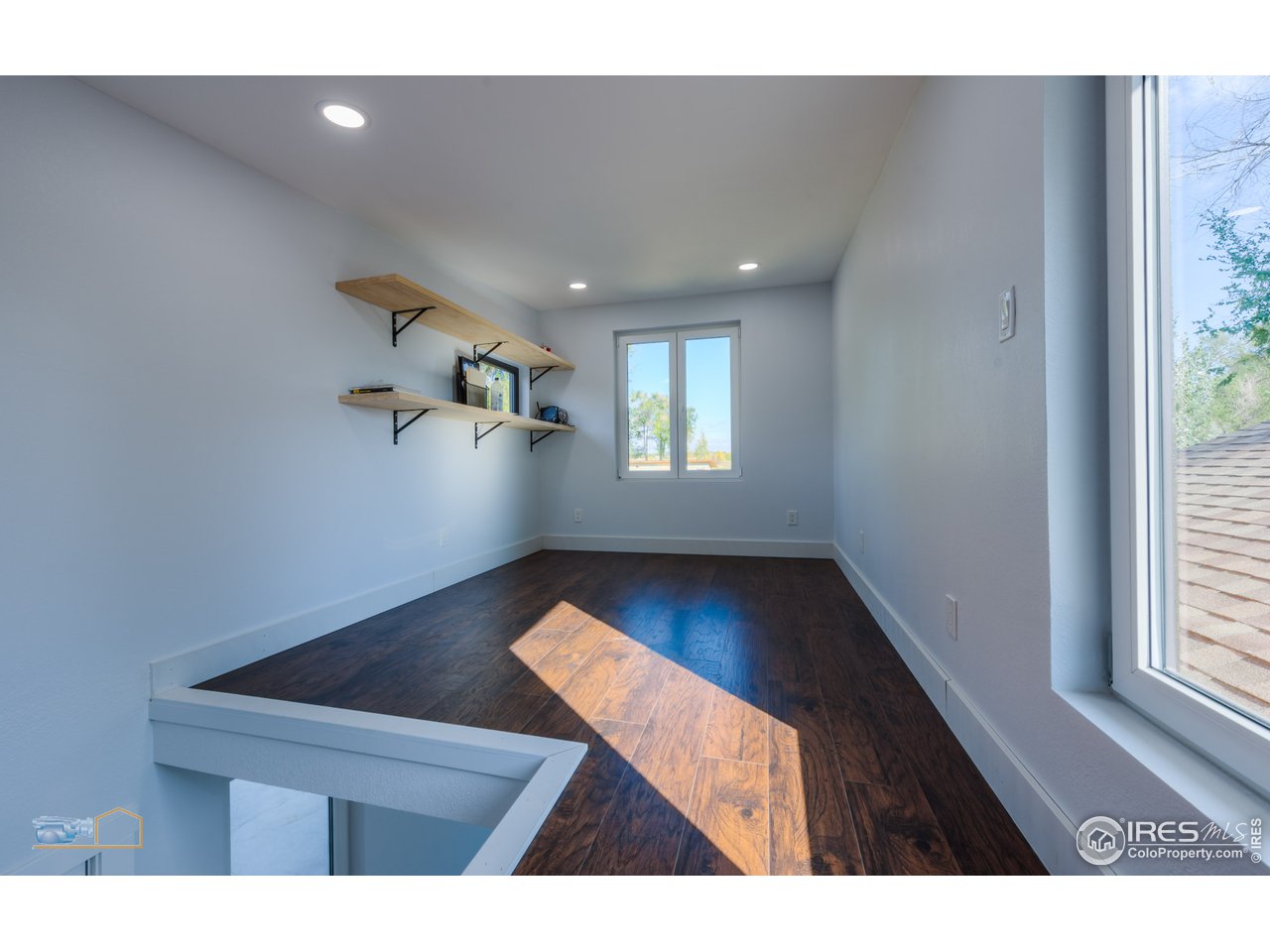 8155 Hygiene Road Longmont, CO 80503 - Photo 38 of 40 a view interior of house and hall with wooden floor