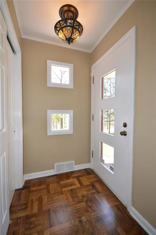 2610 Pulaski Road New Castle, PA 16105 - Photo 2 of 25 Front entry features beautiful hardwood floors, large closet and plenty of light.