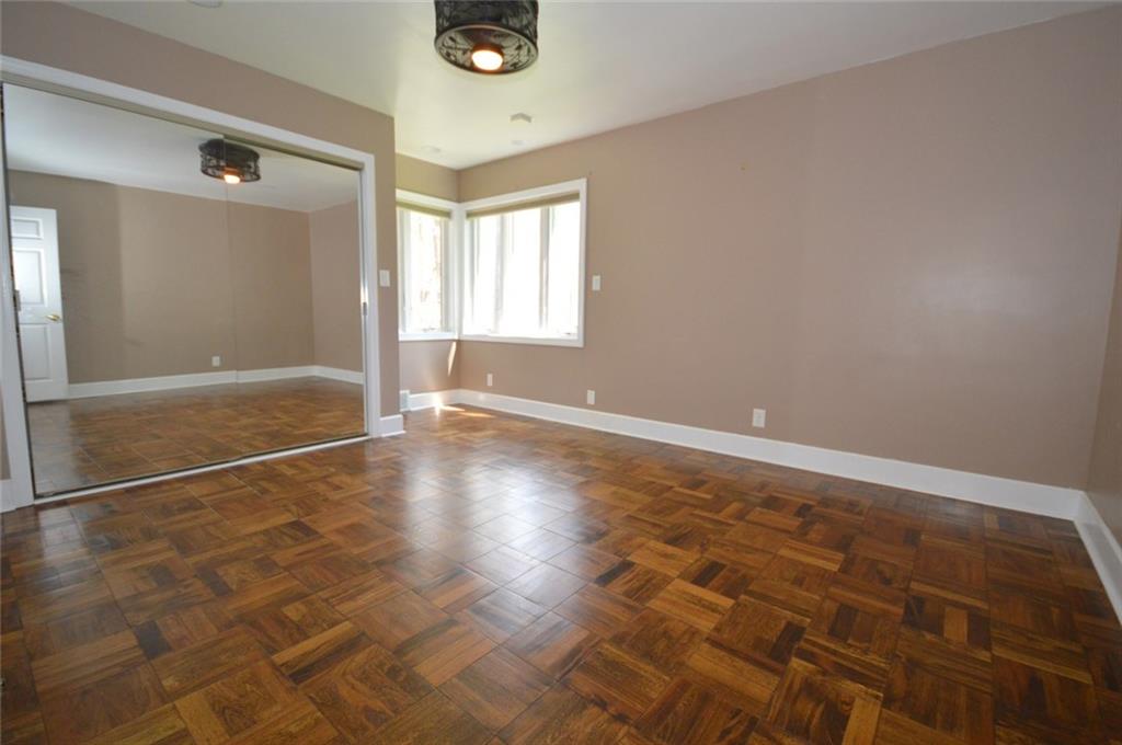 2610 Pulaski Road New Castle, PA 16105 - Photo 11 of 25 Master bedroom suite features refinished hardwood floors & neutral color scheme.