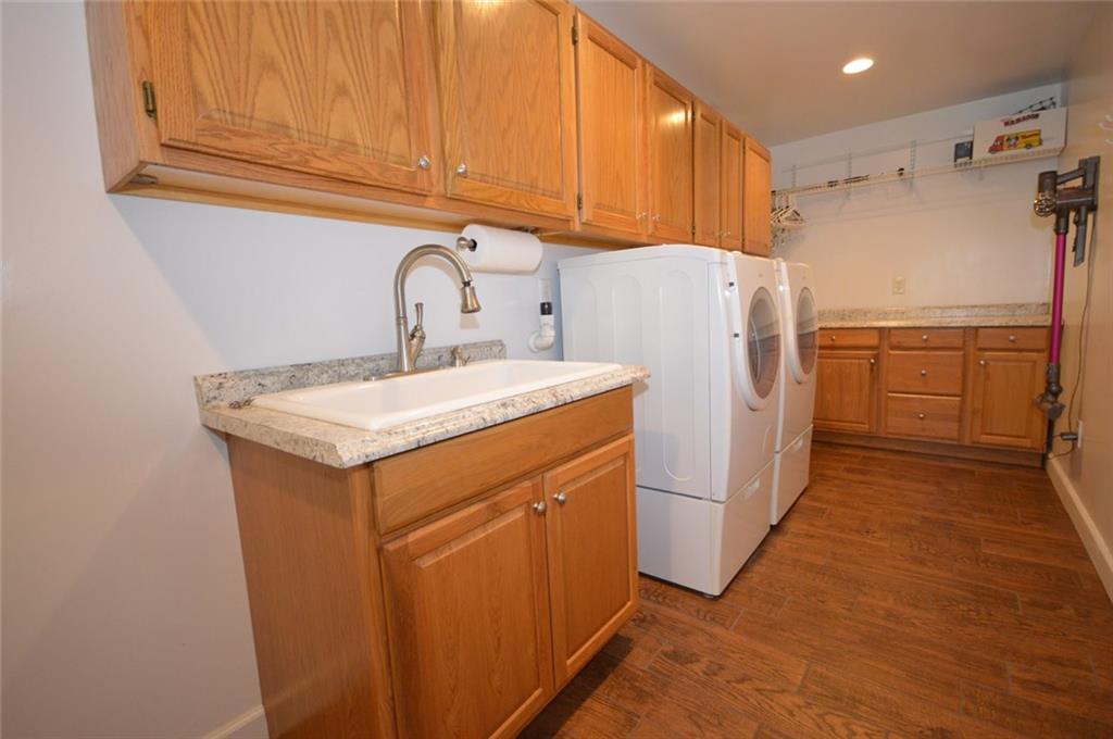 2610 Pulaski Road New Castle, PA 16105 - Photo 16 of 25 Main floor laundry area is accessed from both the garage and kitchen areas. Tons of extra storage, laundry sink, large counter for folding will take the chore out of doing the laundry.