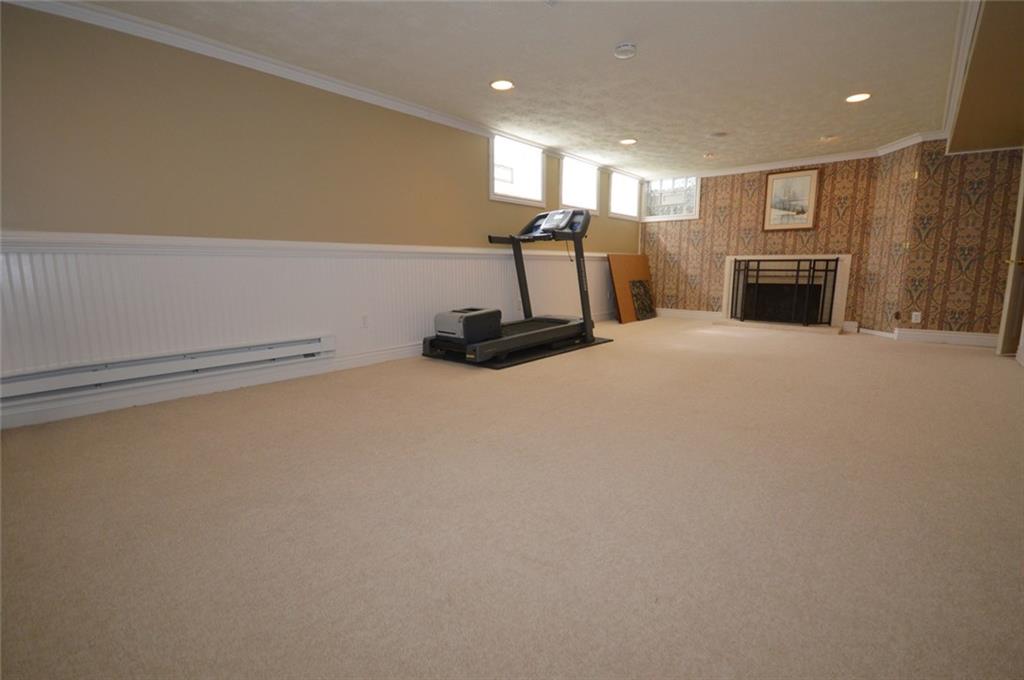 2610 Pulaski Road New Castle, PA 16105 - Photo 17 of 25 Large finished gameroom in the basement provides an opportunity for additional living space or even a teen or in law suite.