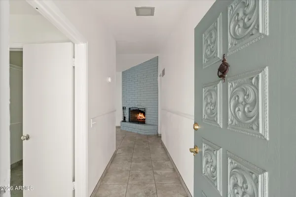 a view of a hallway with entryway