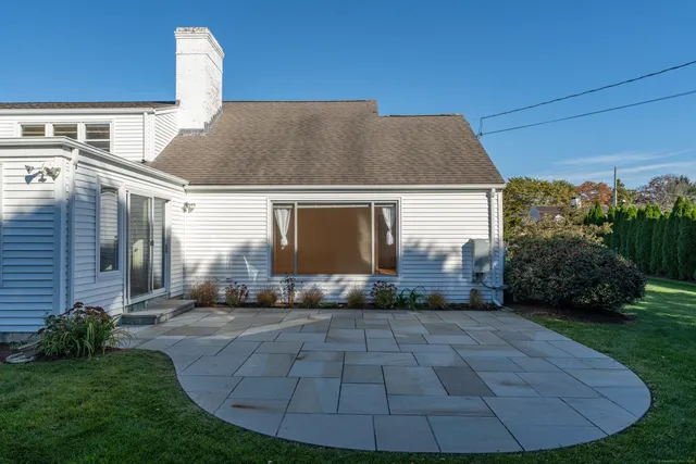 a view of a back yard of the house