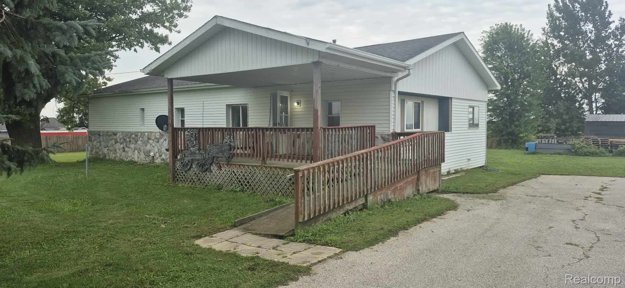 6935 Sanilac Road Marlette, MI 48453 - Photo 2 of 23 887f36447c1a30921927816fc9f59434.JPEG