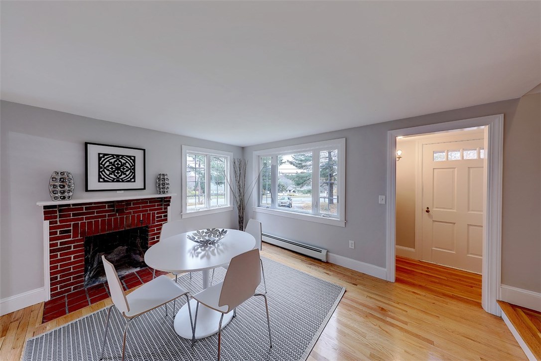 59 Angell Road Cumberland, RI 02864 - Photo 18 of 39 Dining Room with Brick Fireplace