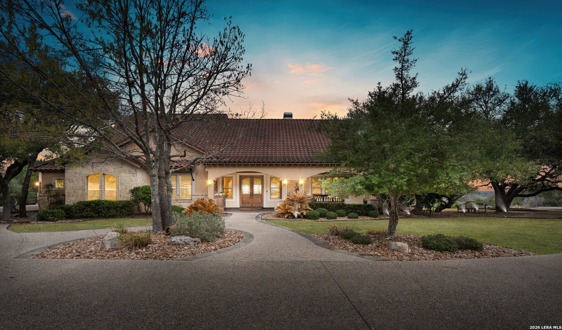 136 Park Ridge Boerne, TX 78006 - Photo 1 of 47 a front view of a house with a yard and garage