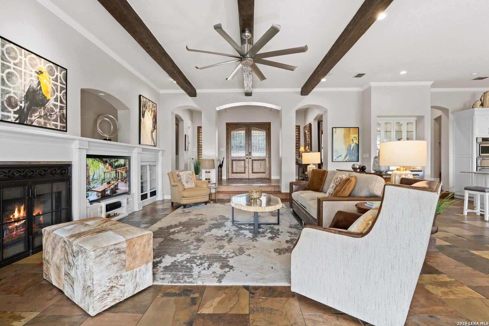 136 Park Ridge Boerne, TX 78006 - Photo 12 of 47 a living room with furniture a fireplace and a chandelier