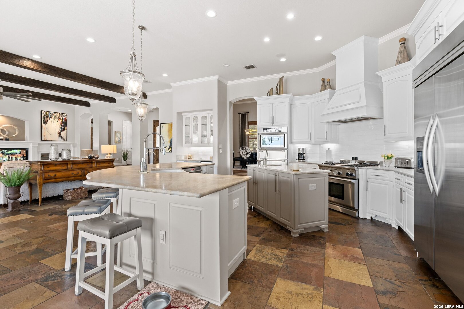 136 Park Ridge Boerne, TX 78006 - Photo 16 of 47 a kitchen with white cabinets and stainless steel appliances