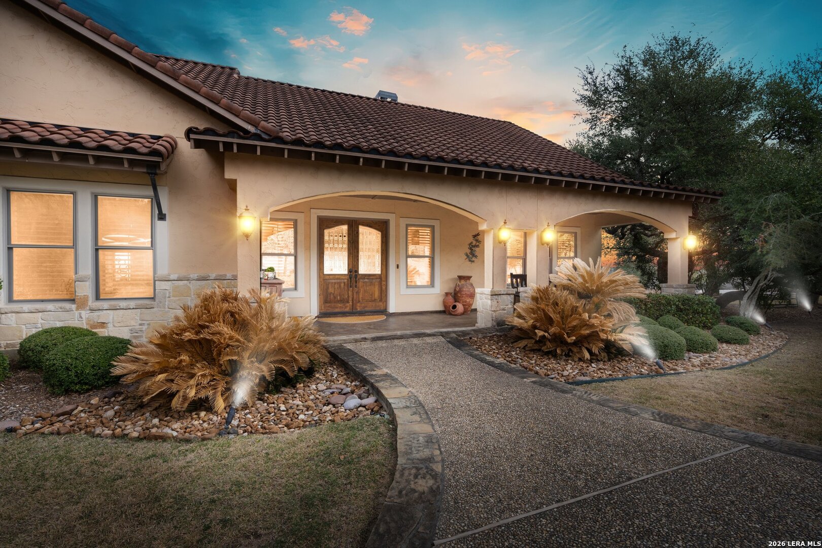 136 Park Ridge Boerne, TX 78006 - Photo 2 of 47 a front view of a house with garden