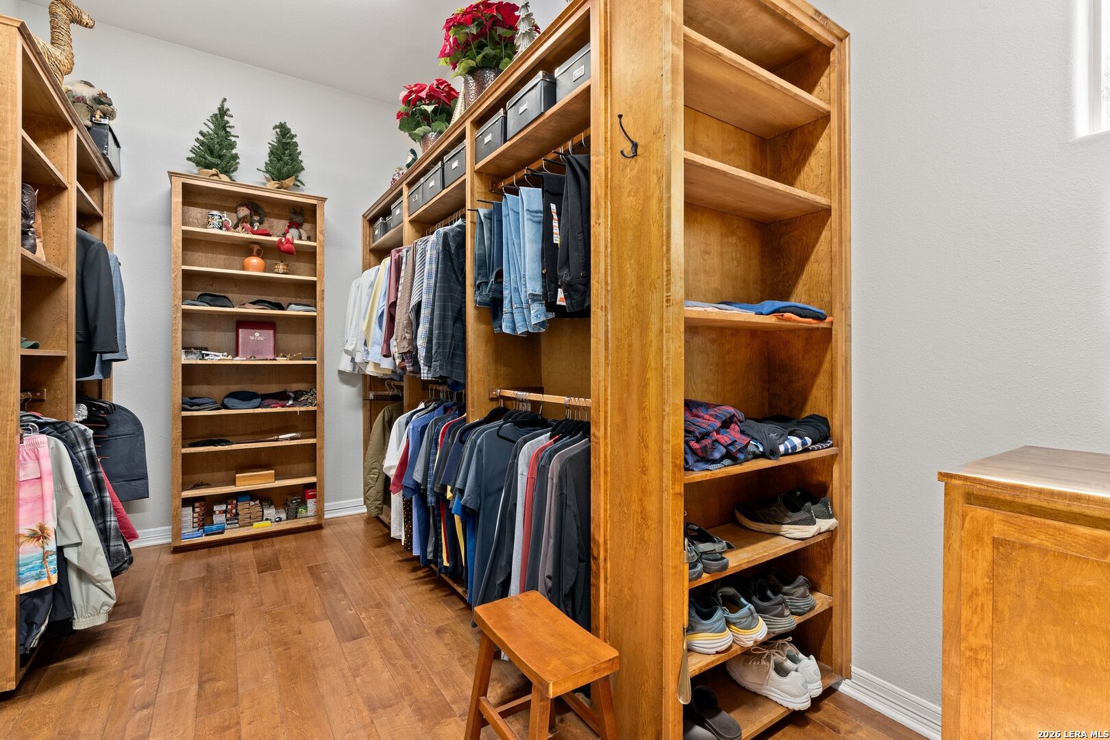 136 Park Ridge Boerne, TX 78006 - Photo 21 of 47 a view of walk in closet with clothes and shoes