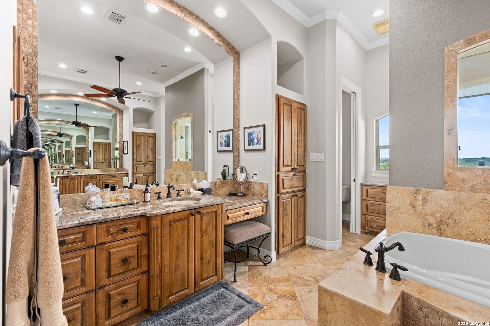 136 Park Ridge Boerne, TX 78006 - Photo 24 of 47 a bathroom with a tub sink and mirror