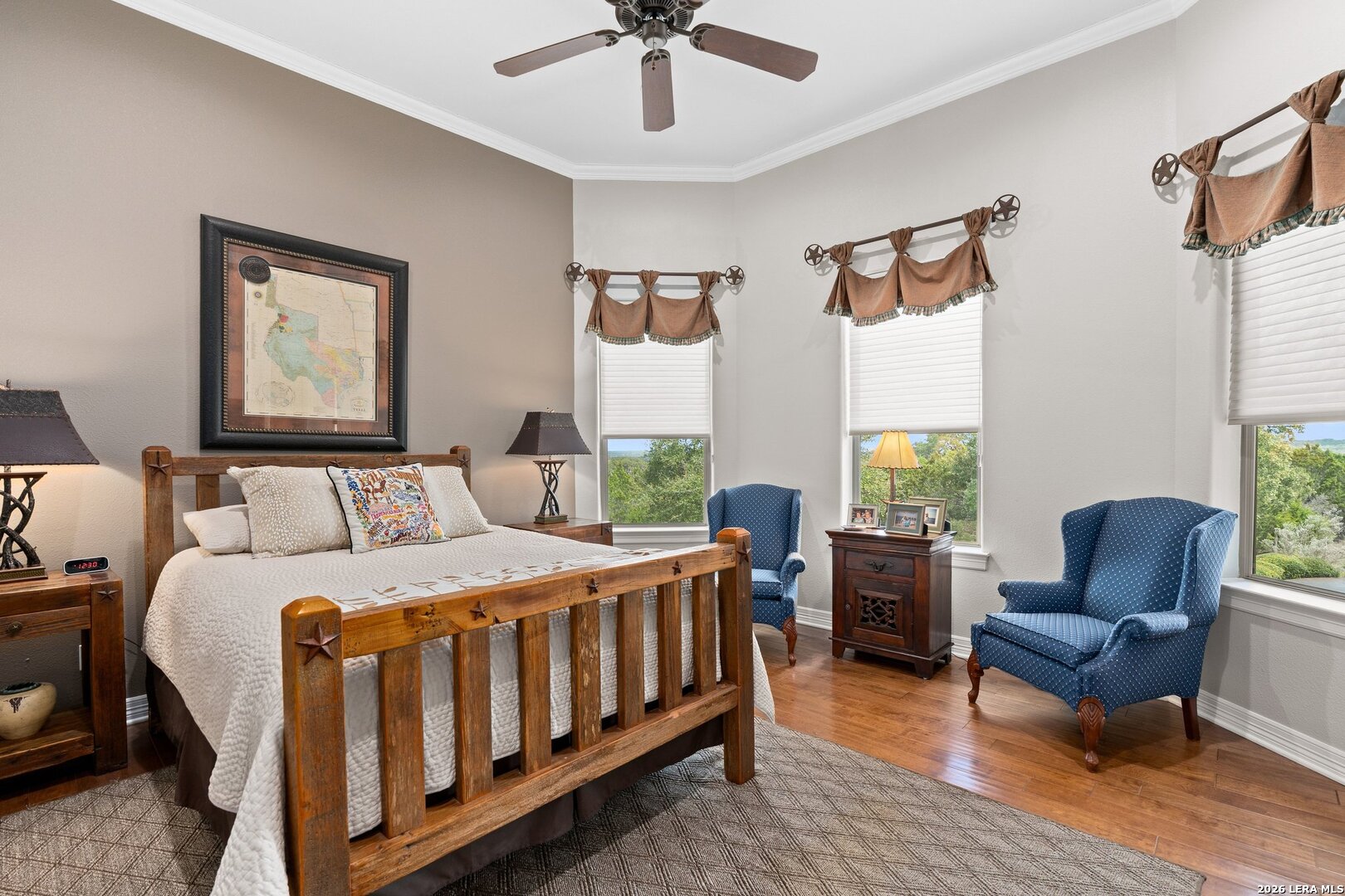 136 Park Ridge Boerne, TX 78006 - Photo 25 of 47 a bedroom with a bed a couch and a window