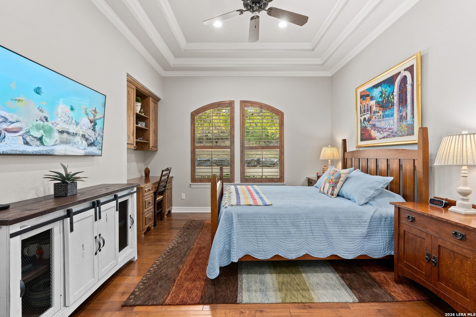 136 Park Ridge Boerne, TX 78006 - Photo 27 of 47 a bedroom with a bed a dresser next to a window
