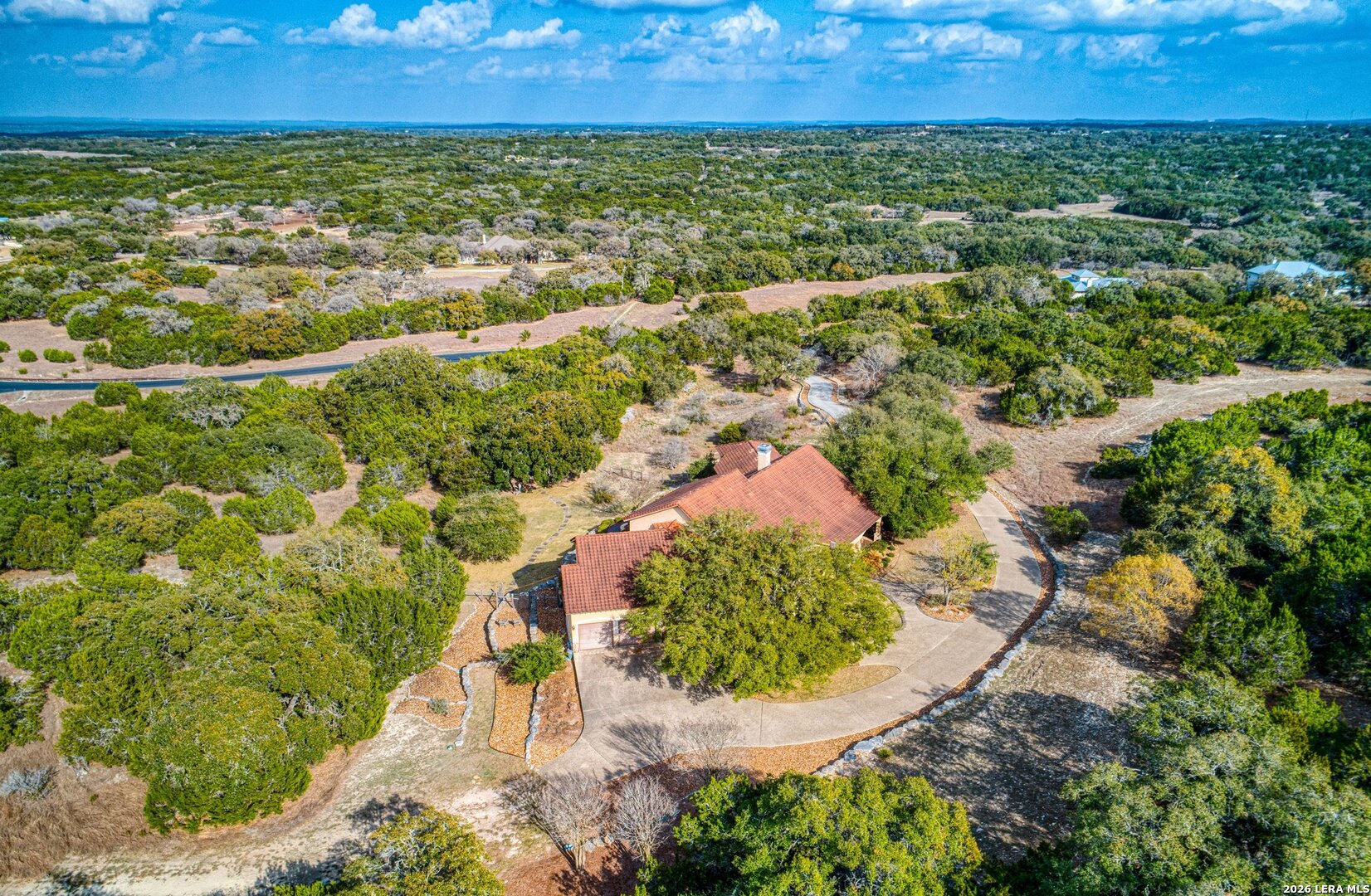 136 Park Ridge Boerne, TX 78006 - Photo 44 of 47 an aerial view of residential houses with outdoor space and trees
