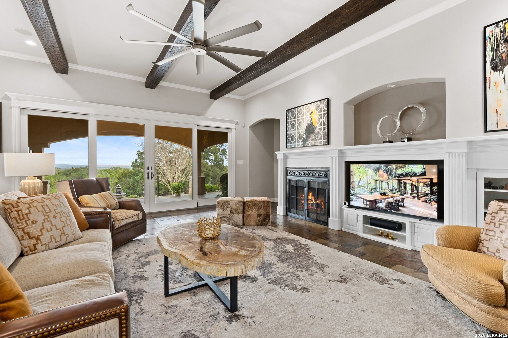 136 Park Ridge Boerne, TX 78006 - Photo 9 of 47 a living room with furniture a fireplace and a flat screen tv