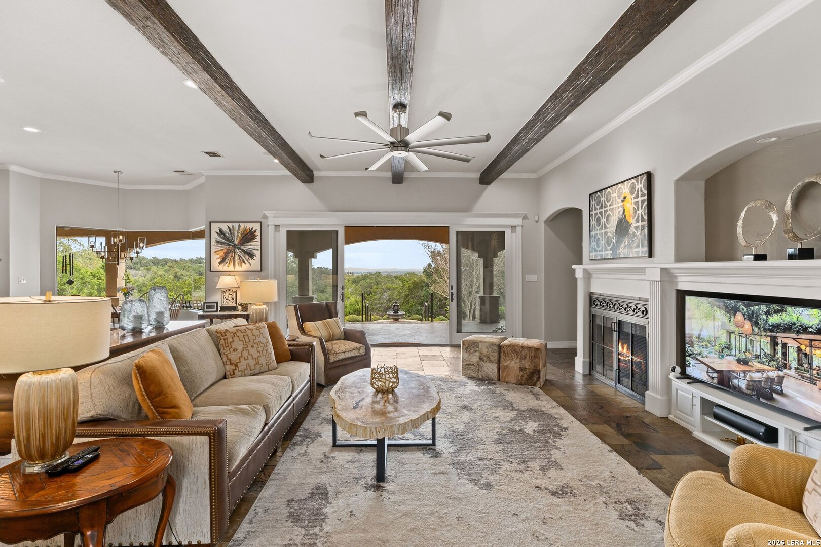 136 Park Ridge Boerne, TX 78006 - Photo 10 of 47 a living room with furniture a fireplace and a large window