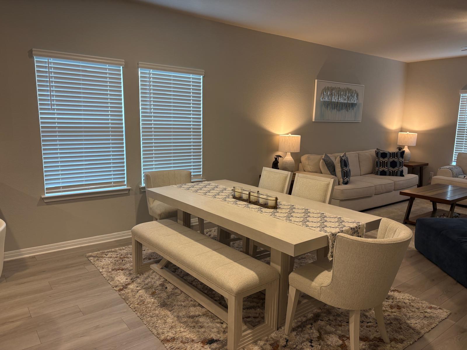 6511 Dragride Road Buda, TX 78610 - Photo 35 of 36 This seamless floorplan integrates a dining area with views into the comfortable living space.