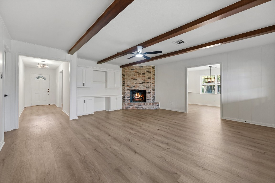 210 Ridgemont Drive Alvin, TX 77511 - Photo 10 of 25 a view of a livingroom with wooden floor and furniture