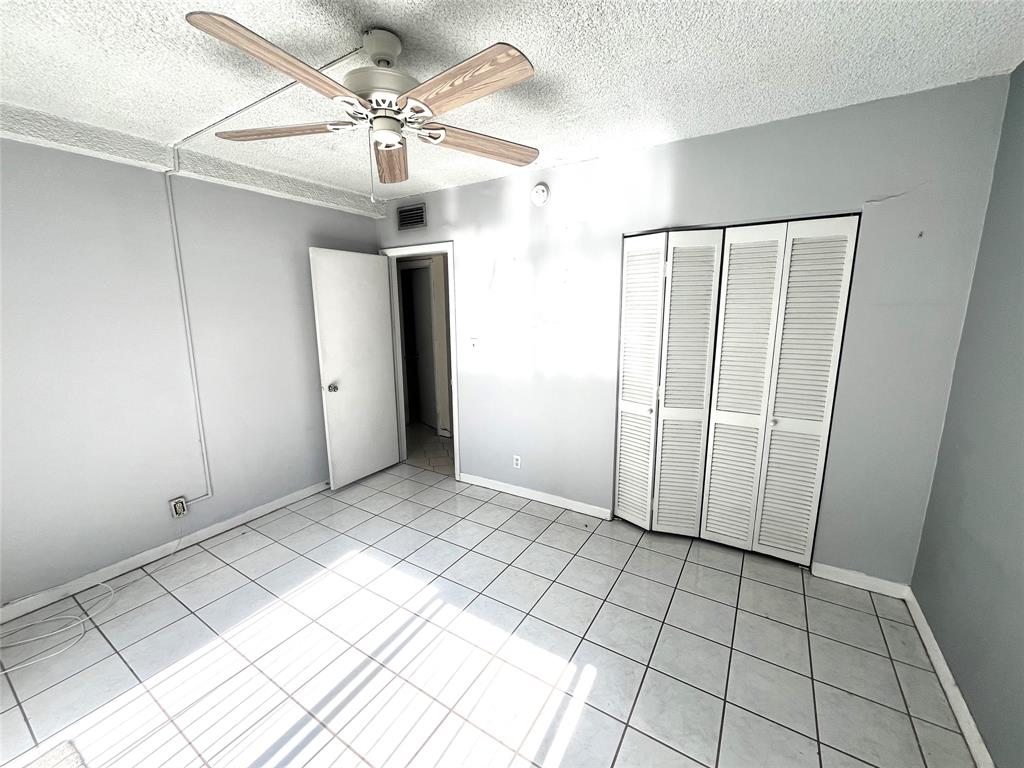 751 Pine Drive, Unit 103 Pompano Beach, FL 33060 - Photo 13 of 18 a view of an empty room