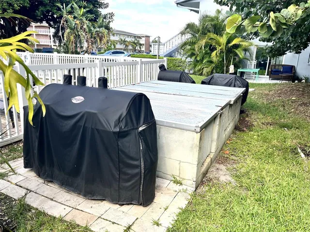 a utility room with a sink a washer and dryer