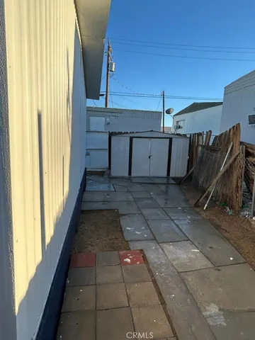 a view of a hallway with seating area