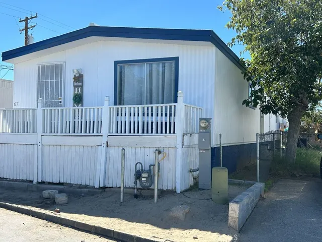 a view of a house with a patio