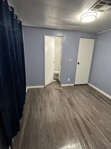 wooden floor in an empty room with wooden floor