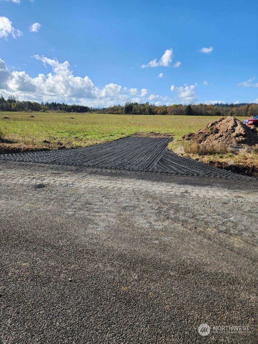 207 Allison Road Ethel, WA 98542 - Photo 9 of 13 a view of a lake with a mountain
