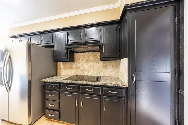 a close view of a refrigerator in kitchen