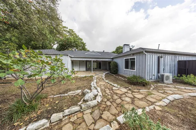 a view of house with outdoor space