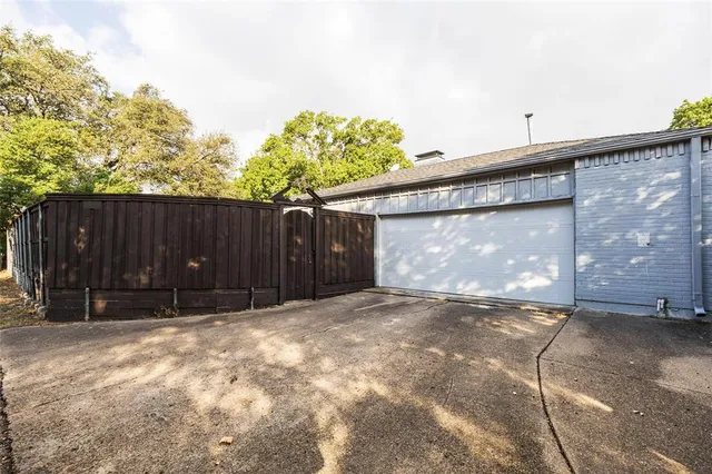 a view of backyard with green space