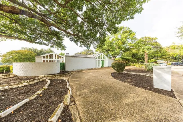 a view of a backyard of the house