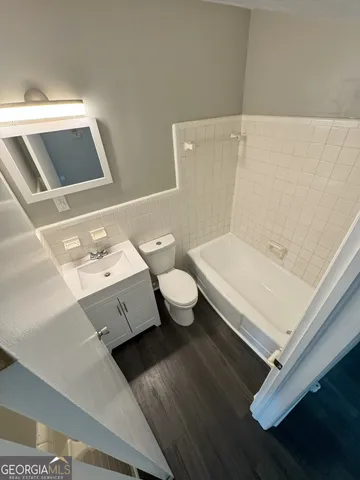 a bathroom with a sink and a toilet