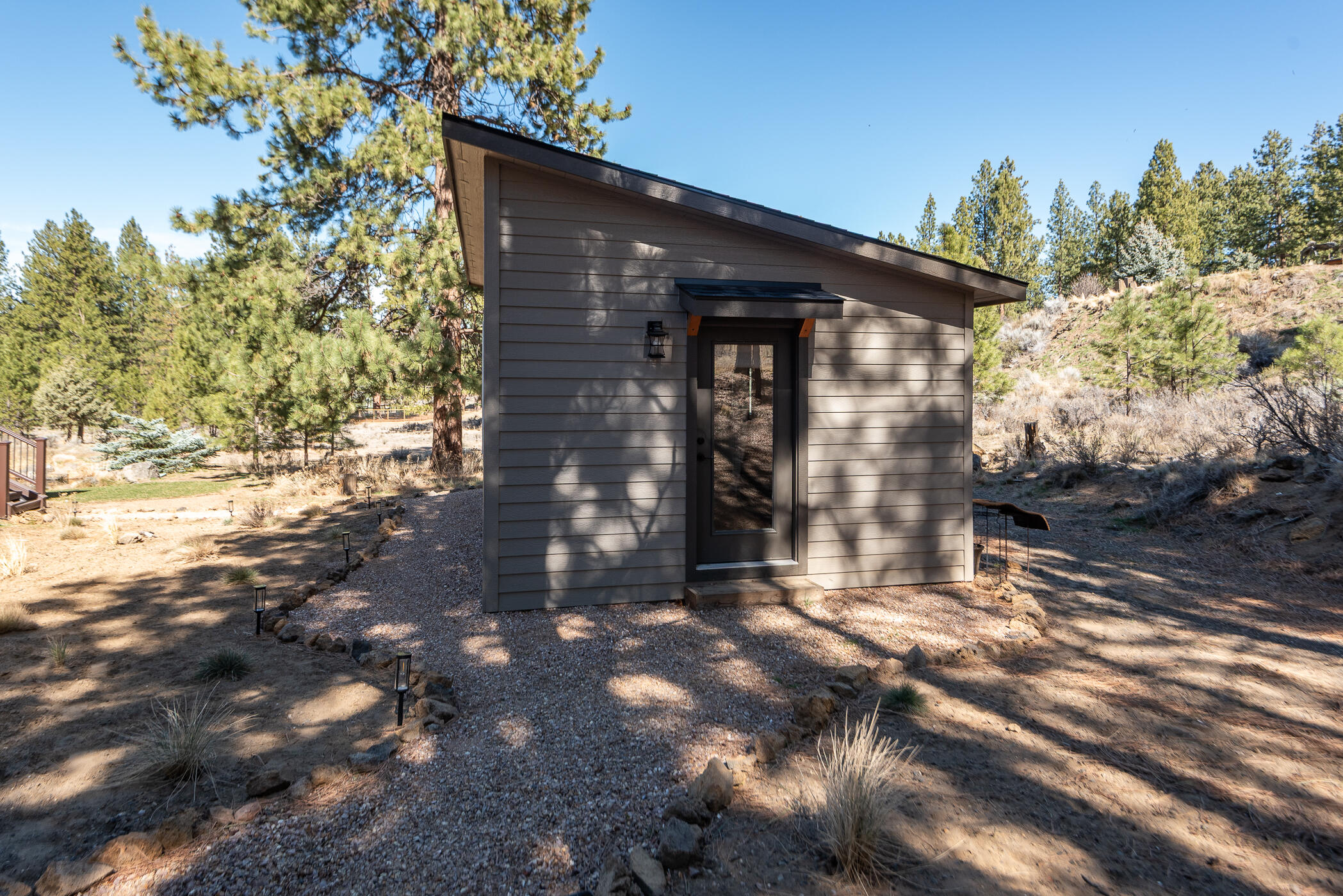 60012 West Ridgeview Drive Bend, OR 97702 - Photo 30 of 55 a view of a house with a tree