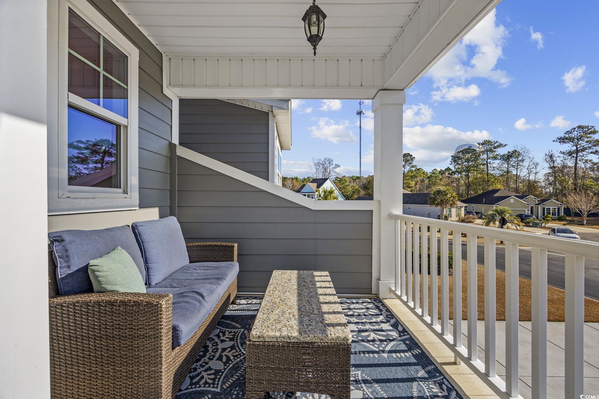 147 Hyacinth Loop Murrells Inlet, SC 29576 - Photo 25 of 40 Balcony with outdoor lounge area