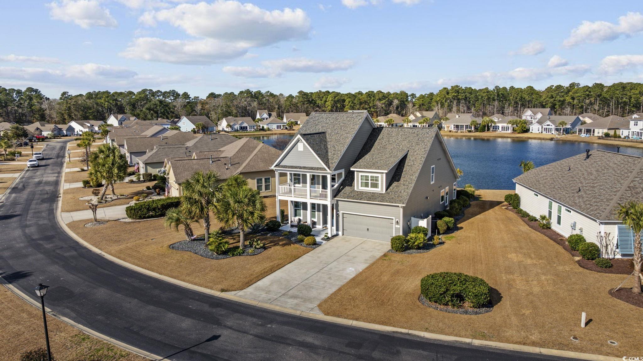 147 Hyacinth Loop Murrells Inlet, SC 29576 - Photo 33 of 40 Aerial perspective of suburban area featuring a large body of water