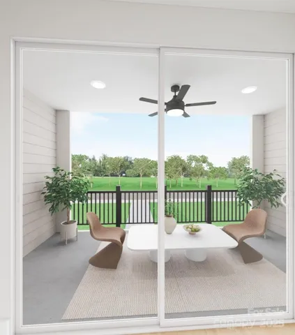 a view of a balcony with furniture