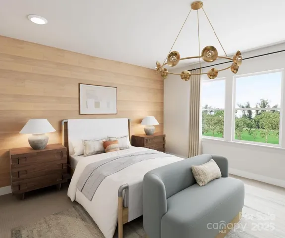 a bedroom with bed and a window