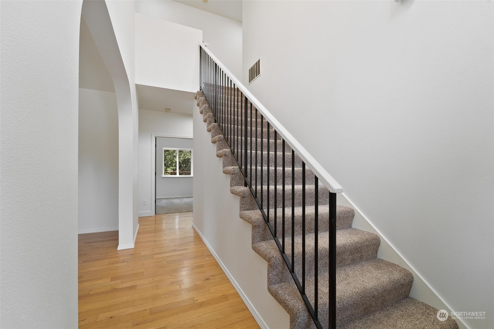 3321 Whiteman Road Southwest Longbranch, WA 98349 - Photo 11 of 40 a view of a hallway with wooden floor and entryway